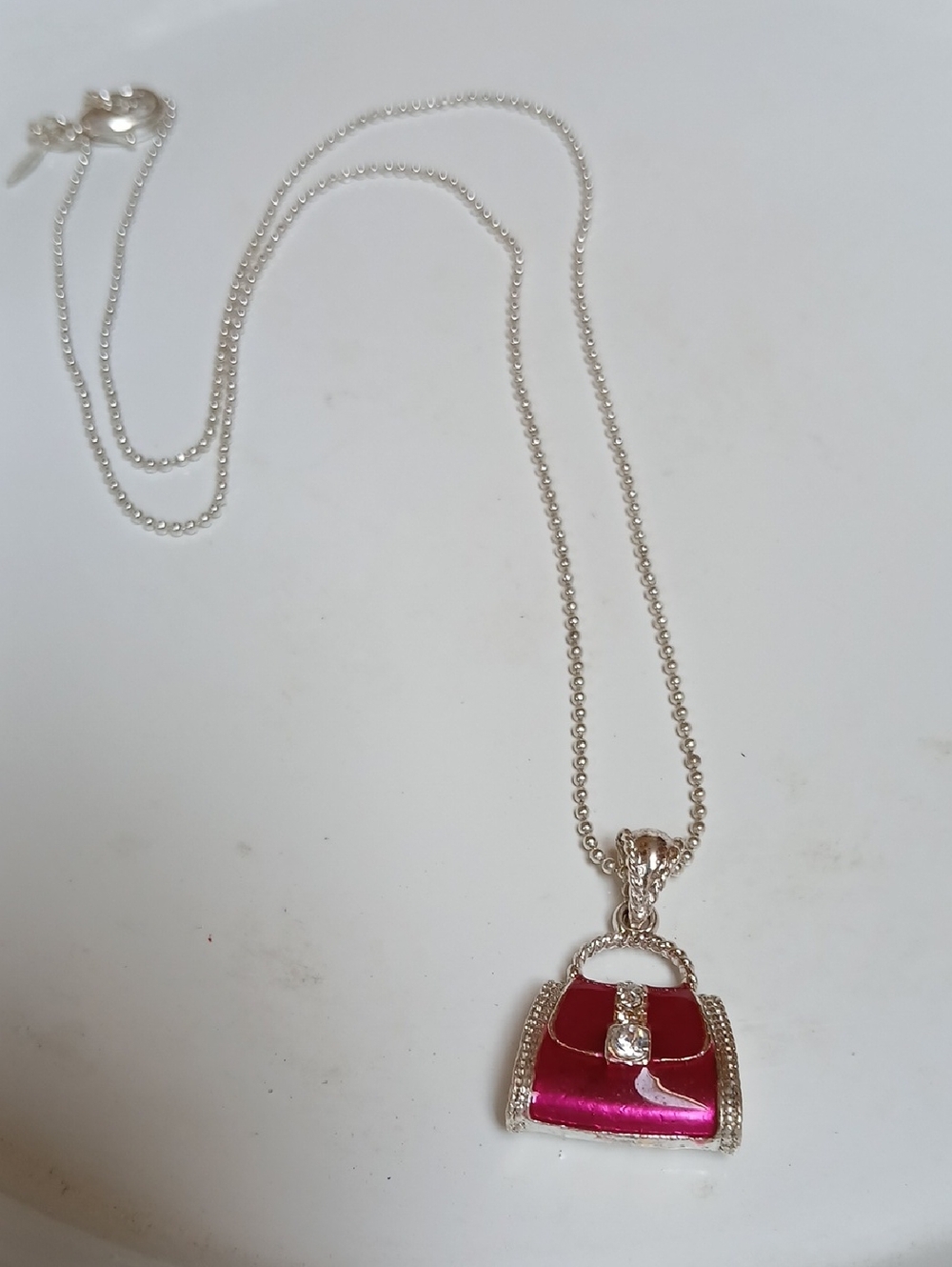 Avon Silver Necklace with Bright Pink Handbag Pendant